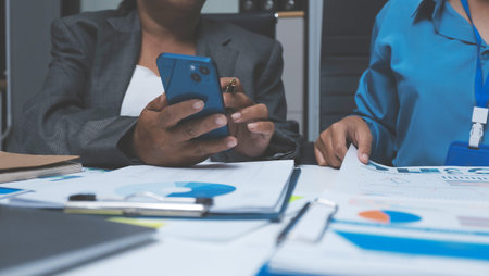 Auditor and accountant team working in office, analyze financial data and accounting record with...