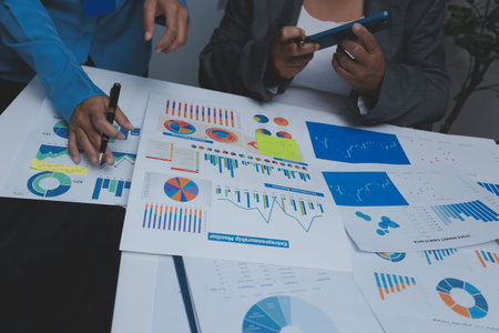 Auditor and accountant team working in office, analyze financial data and accounting record with...