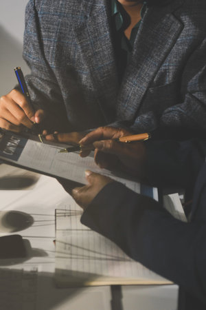 Businesswoman and Male lawyer or judge consult and conference having team meeting with client at law firm in office, Law and Legal services conceptの写真素材