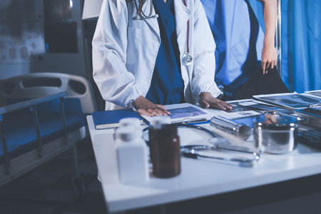 Doctors are meeting at the hospital to discuss treatment options and share experiences with colleagues.の写真素材