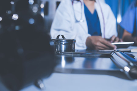 Doctors are meeting at the hospital to discuss treatment options and share experiences with colleagues.の写真素材