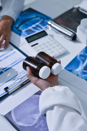 Doctor Explaining X-Ray Results to a Patient Using a Digital Device
