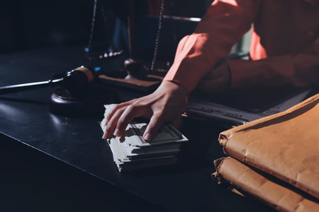 Consultation and conference of professional businesswoman and Male lawyers working and discussion having at law firm in office. Concepts of law, Judge gavel with scales of justiceの写真素材