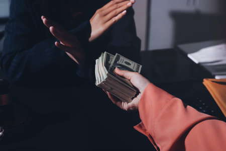 Consultation and conference of professional businesswoman and Male lawyers working and discussion having at law firm in office. Concepts of law, gavel with scales of justiceの写真素材