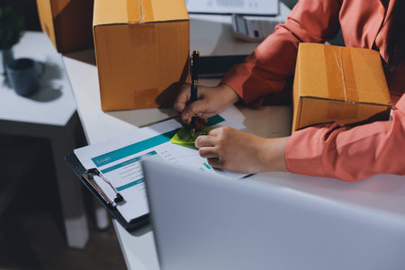 Startup, small business, SME owner check online orders. data logging Business growth, selling...