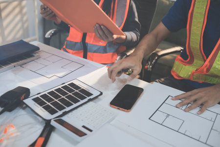 Concept Architect and desk of Architectural project in construction site or office building with...