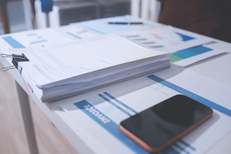 Accounting company provide finance and taxation planning for profitable cash flow, Auditor and accountant team working in office, analyze financial data and accounting record with calculatorの写真素材