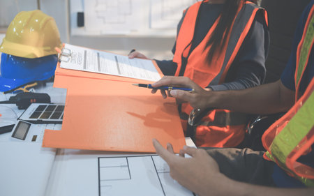 Concept Architect and desk of Architectural project in construction site or office building