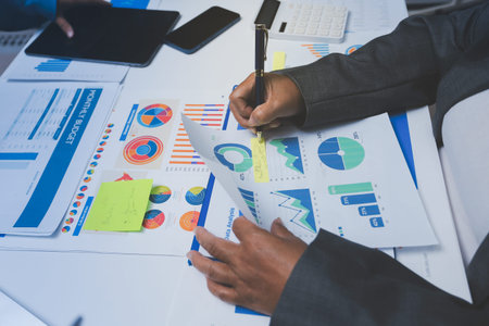 Auditor and accountant team working in office, analyze financial data and accounting record with...