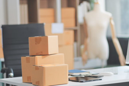 Starting small businesses SME owners female entrepreneurs check online orders to prepare to pack the...