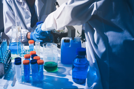 Science, laboratory and woman with pipette, test tube and biotech solution in research. Medical...