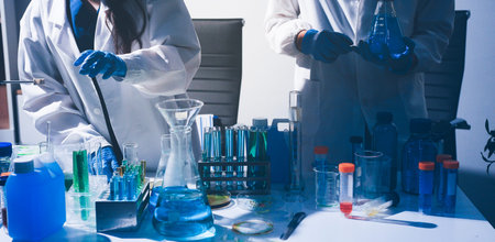 Science, laboratory and woman with pipette, test tube and biotech solution in research. Medical...