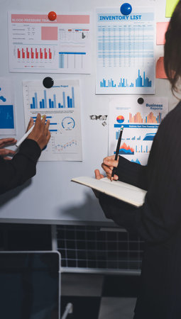 business people in meeting discussing plans together