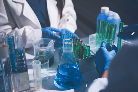 Science, laboratory and woman with pipette, test tube and biotech solution in research. Medical...
