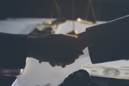 Businesswoman and Male lawyer or judge consult and conference having team meeting with client at law...