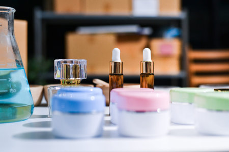 Woman making organic cosmetics with aloe in laboratory