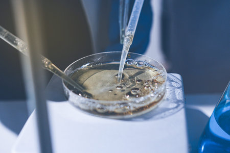 Science, laboratory and woman with pipette, test tube and biotech solution in research. Medical innovation, scientist or lab technician in study for healthcare, medicine and vaccine results feedback.