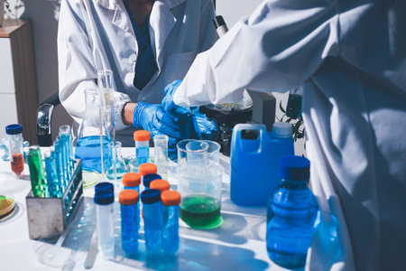 Science, laboratory and woman with pipette, test tube and biotech solution in research. Medical innovation, scientist or lab technician in study for healthcare, medicine and vaccine results feedback.