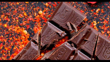 A top view on a chocolate bar on an original backgroundの写真素材