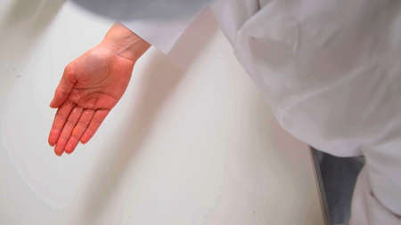 A top view on a hand of a woman with gel