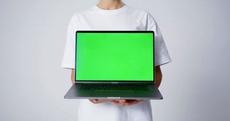 A laptop with a green screenの写真素材