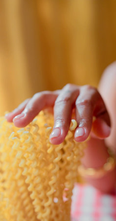 A woman is touching pastaの写真素材