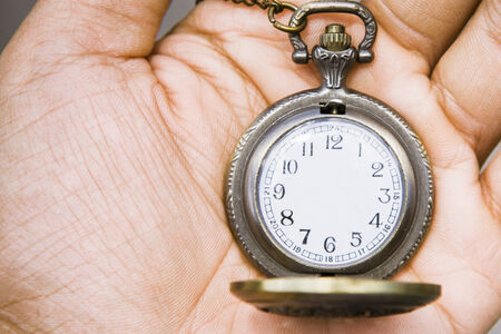 Photo Illustration of pocket watch without the hour handsの写真素材