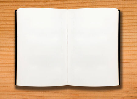 open book on wooden tableの写真素材