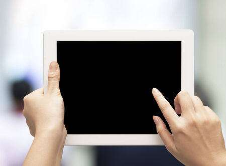 hand holding digital tabletの写真素材