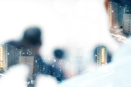 Double expose of  business people in conference room  backgroundの写真素材