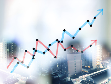 Double expose of growth bar chart with blurred business people backgroundの写真素材