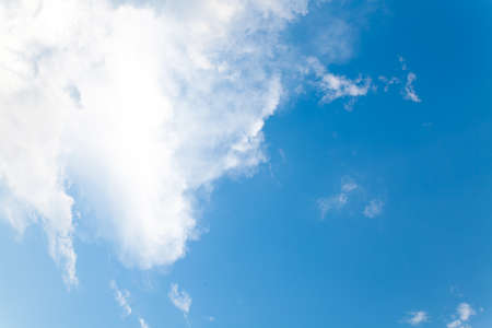 Blue sky with clouds backgroundの写真素材