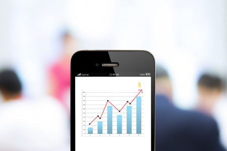 close up  mobile phone with analyzing graphの写真素材