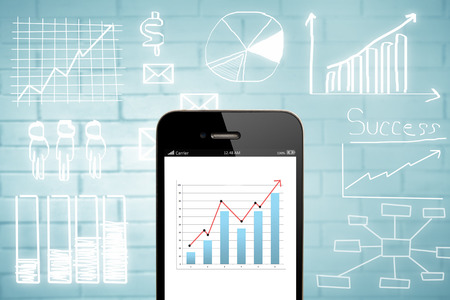 Business chart on smart phone   with drawing business plan concept,mobile strategy, business finance concept.の写真素材
