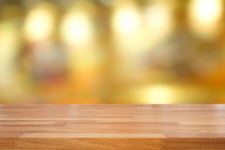 Empty wooden table and blurred cafe background, product display,montage