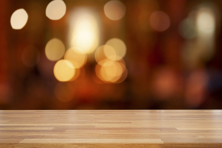 Empty wooden table and abstract bokeh blurred color light background, product display ,Ready for product montage, Christmas holidayの写真素材