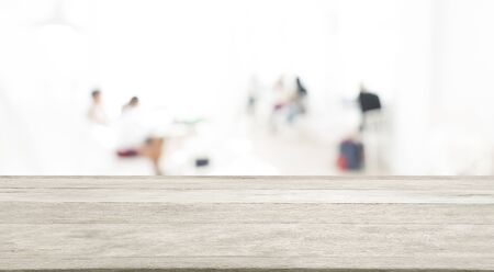 Empty wooden and table on abstract white modern cafe background  with blur people , product display, Ready for product montageの写真素材