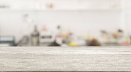 Empty wooden and table on abstract white modern kitchen background with shelf, product display, Ready for product montageの写真素材