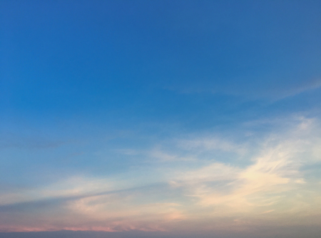 Cloudy sky in evening before sunset at seaの写真素材