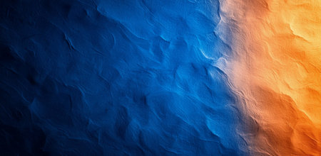 An Abstract blue and orange textured background with wavy pattern, creating visually striking contrast. Ideal for artistic and design projectsの素材