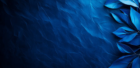 An Elegant blue background with textured leaves, creating serene atmosphere. deep blue tones and intricate details evoke sense of calm and tranquilityの素材