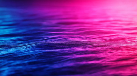 A Vibrant abstract background featuring blurred waves in purple and blue hues, creating dynamic and energetic atmosphere. Perfect for artistic and creative projectsの素材