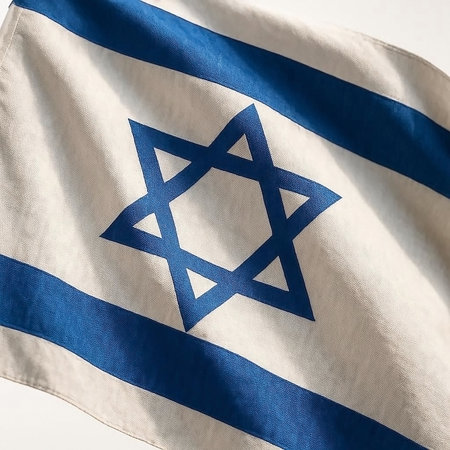 Flag of Israel on a white background. Close-up image.の素材