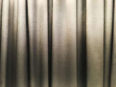 Light gray curtain texture interior decoration in room.の写真素材