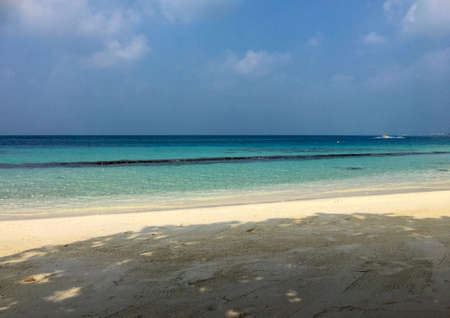 calm blue sea beach in tropical at Maldives island. Soft focus of blue skyの写真素材