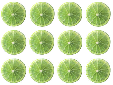 Juicy lime slice circle shape alignment isolated on white backgroundの写真素材