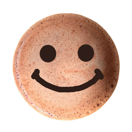Chocolate foam with smile face isolated on white background. Good morning with good mood.の写真素材
