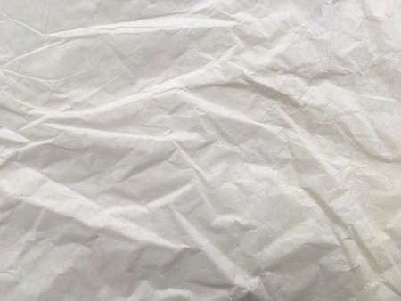 Light brown paper wrinkled texture backgroundの写真素材