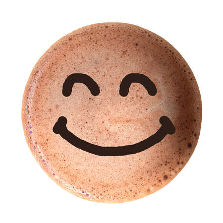 Chocolate foam with smile face isolated on white background. Good morning with good mood.の写真素材