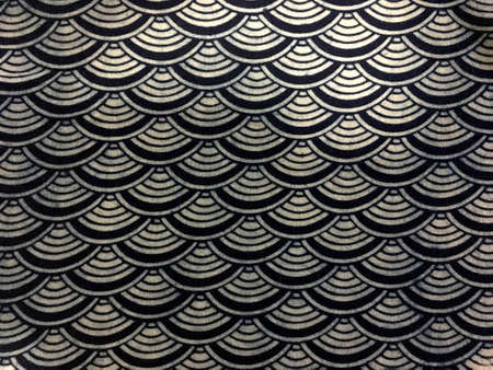 Indigo and white fish scales pattern on Japanese traditional fabric texture background.の写真素材